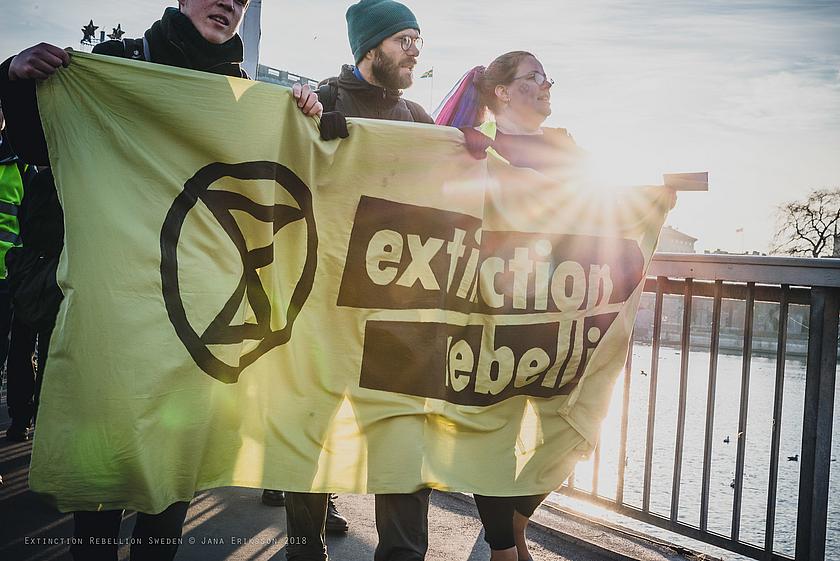 Demonstranten mit einem Extinction Rebellion-Banner Ende 2018 in Stockholm.